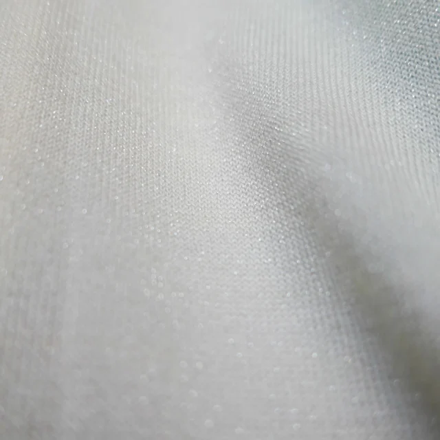 ランク感あふれる、白い銀の光沢。
200切の極細ラメが生み出す、柔らかな風合い。
MASHIRO ESTHER

A refined white-silver shine with a premium feel.
The ultra-fine 0.15 mm metallic yarn creates a soft and supple texture.
MASHIRO ESTHER
Nm1/155
59% Polyester, 41% Nylon

#kyototexyarn #knittingyarn #lamé